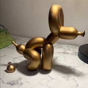 Gold Balloon Dog Pooping Sculpture
